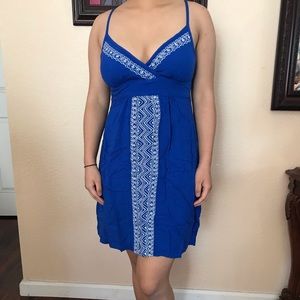 Royal blue dress with white embroidery stitching